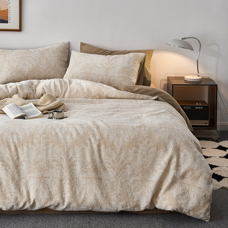 Berriscent atelier damask jacquard cotton bedding set with woven pattern styled on a double bed.