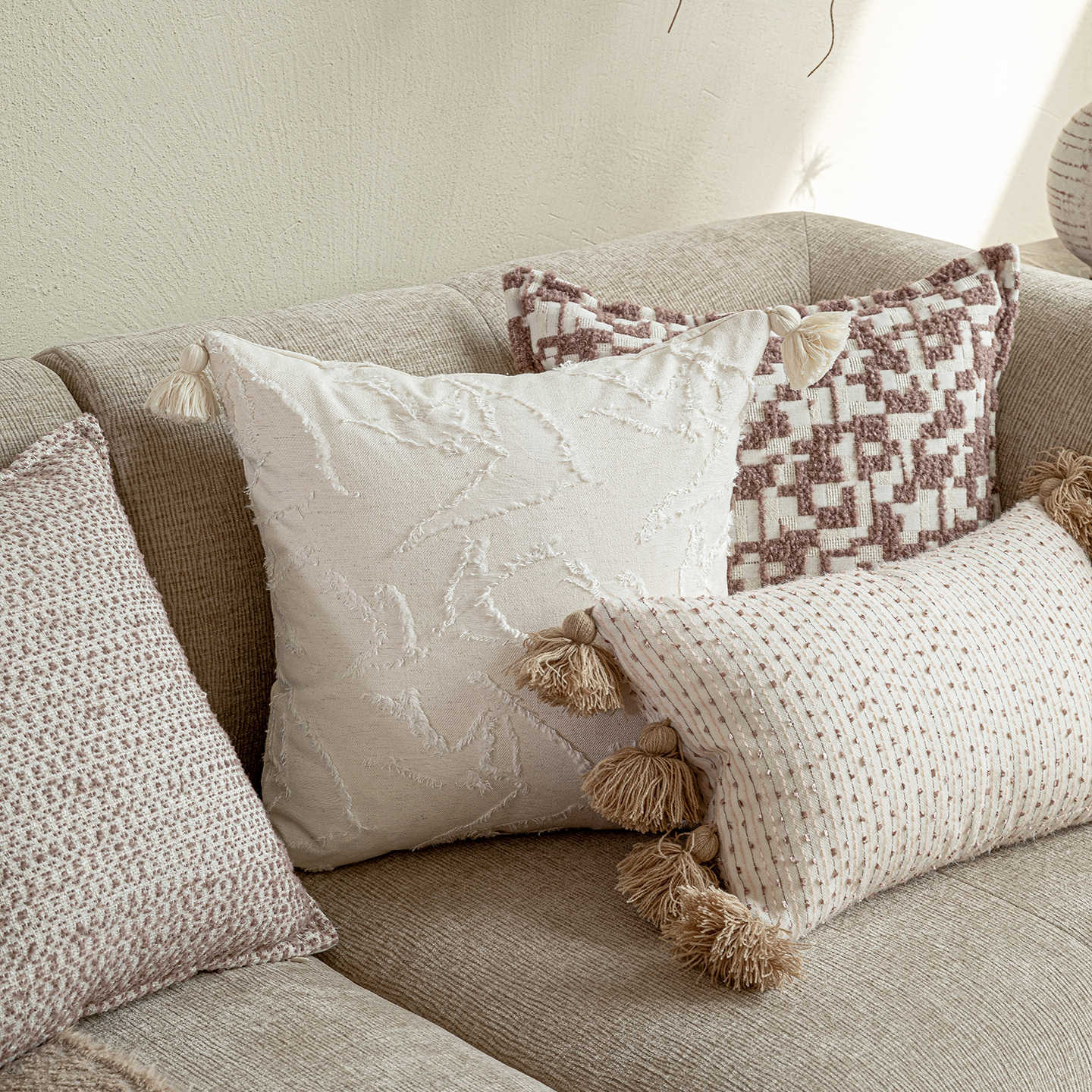 Profile view of a 30x50 cm lumbar pillow highlighting the plush loft of the premium down-filling insert.