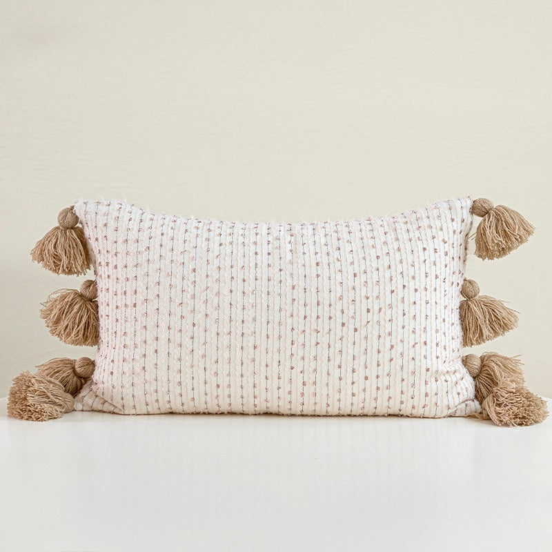 Rectangular 30x50 cm lumbar pillow with neutral stripes and side tassels, shown with premium down-filling loft.